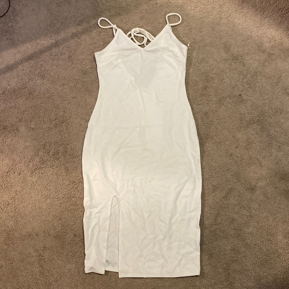 Medium-whitedress with mild slit in front